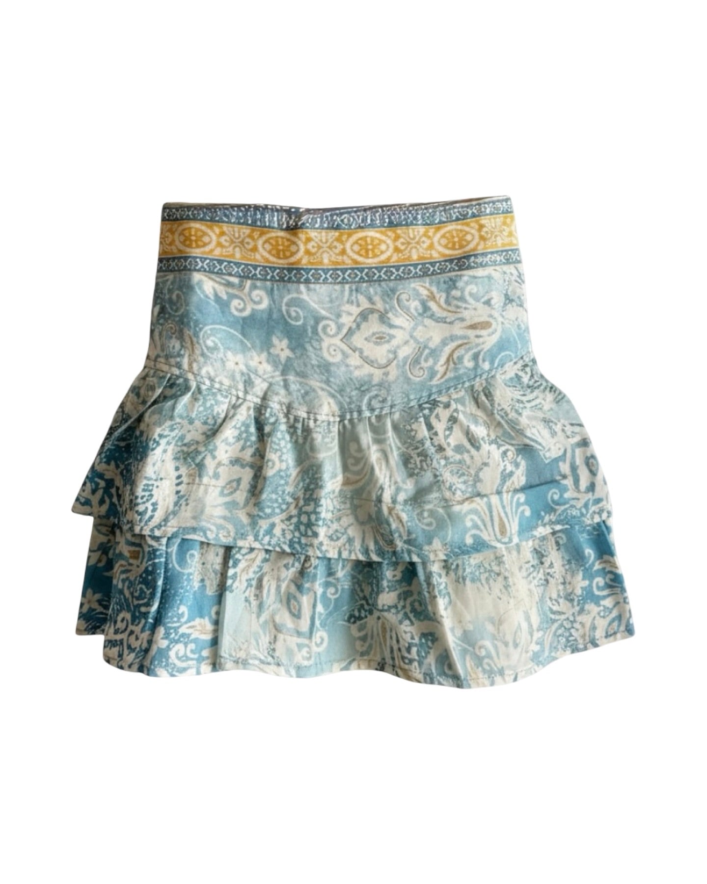 Patterned skirt with ruffled layers on a white background