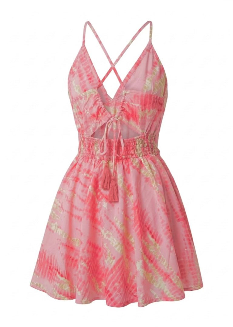 Pink tie-dye dress with criss-cross straps on a white background
