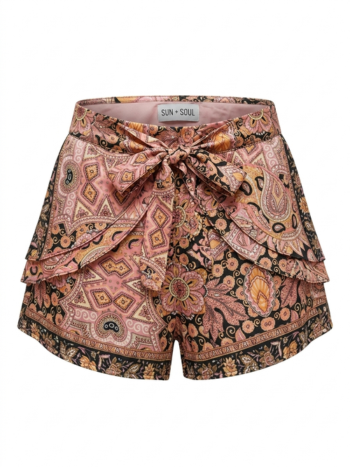 Patterned shorts with a tie detail on a white background