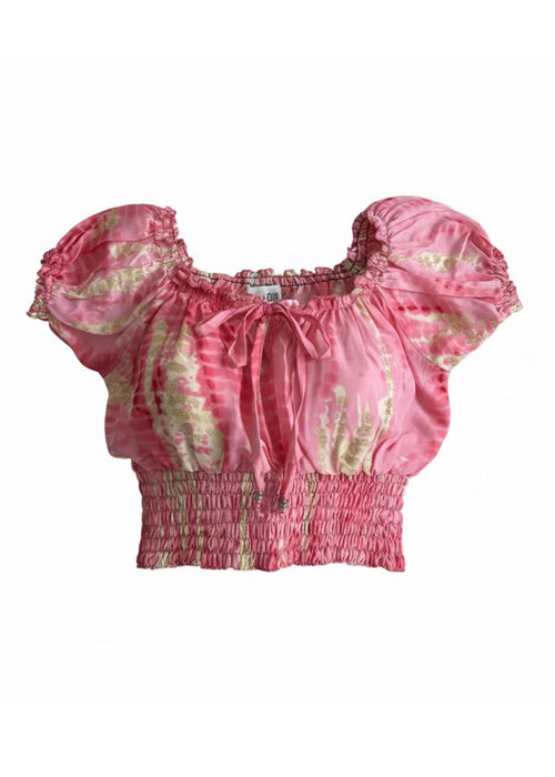 Pink tie-dye crop top with puff sleeves on a white background