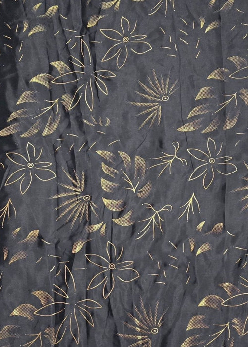 Dark fabric with gold floral pattern and border