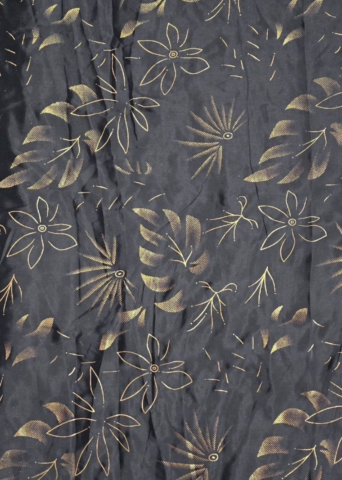 Dark fabric with gold floral pattern and border