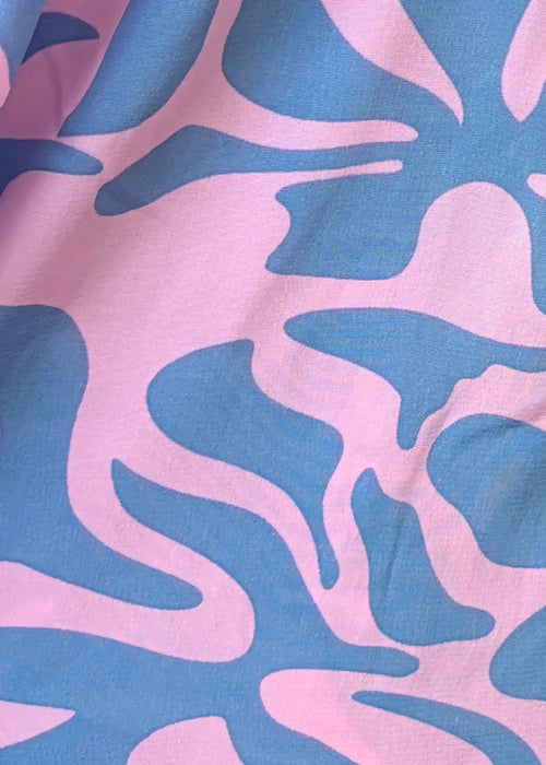 Close-up of pink and blue abstract patterned fabric