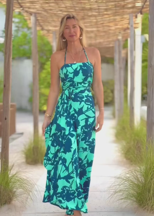 Woman wearing Zyanda silk wrap dress ruched back